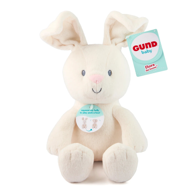 Plush bunny toy with 'Gund baby' tag on a white background