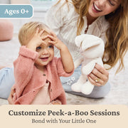 Baby playing peek-a-boo with Flora the Bunny 7 inch plush