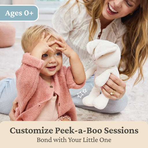 Baby playing peek-a-boo with Flora the Bunny 7 inch plush