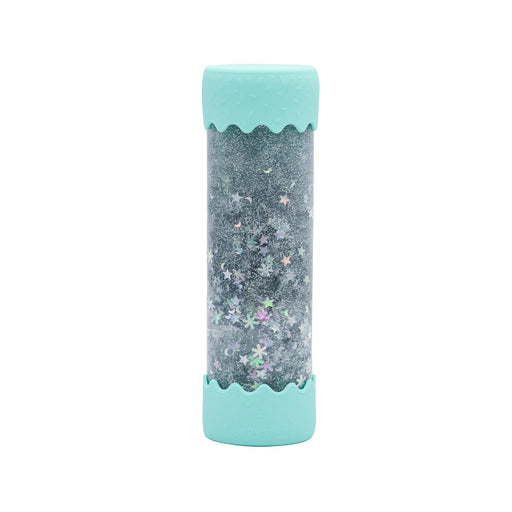 soft mint baby calm down bottle standing upright with swirling glitter
