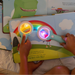 children using magic magnifier to reveal glowing colors on a page