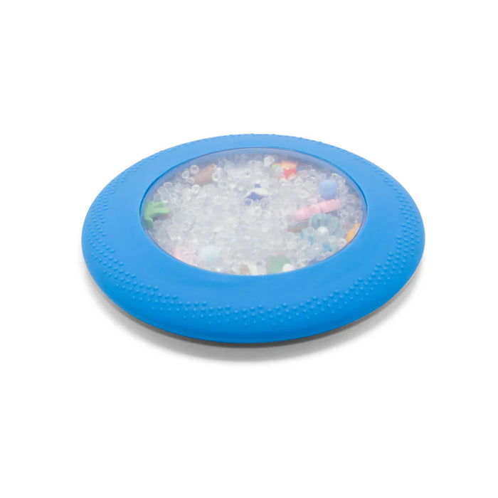 blue peekaboo sensory bag filled with clear beads and tiny beach figurines