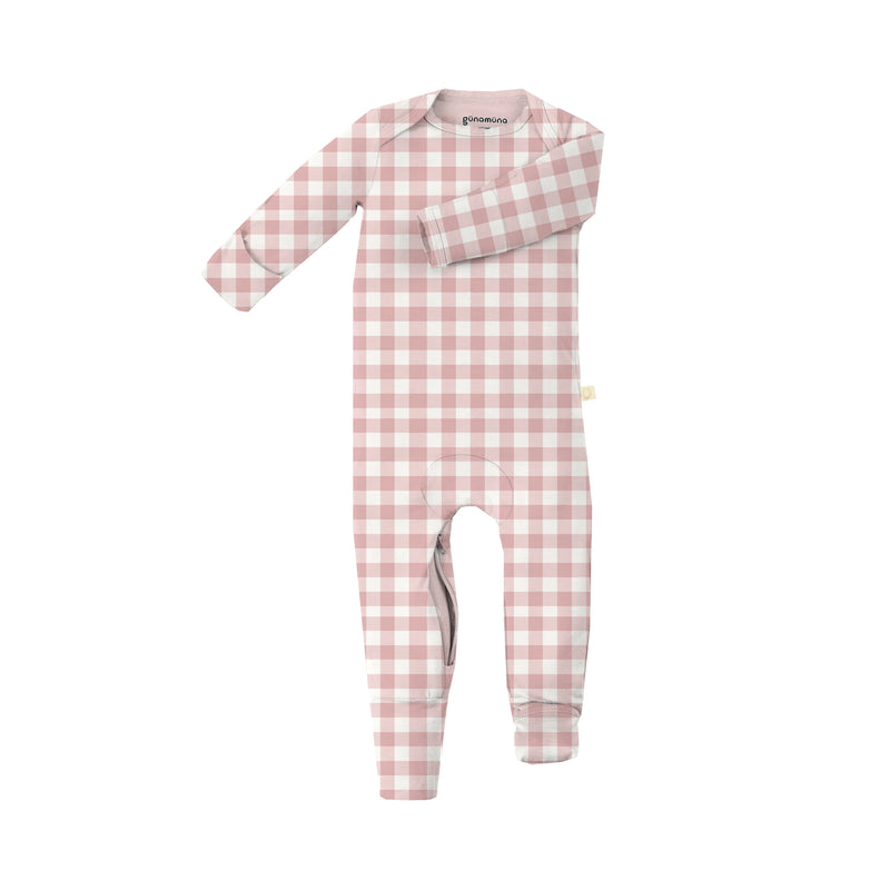 Pink and white checkered baby onesie on a white background