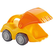 Toy bulldozer with an orange blade on a white background