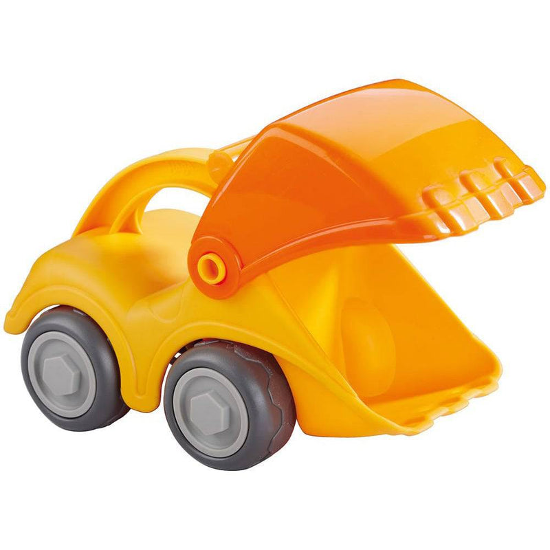 Toy bulldozer with an orange blade on a white background