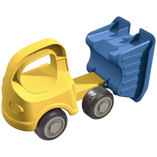 Yellow toy truck with a blue scoop attachment on a white background