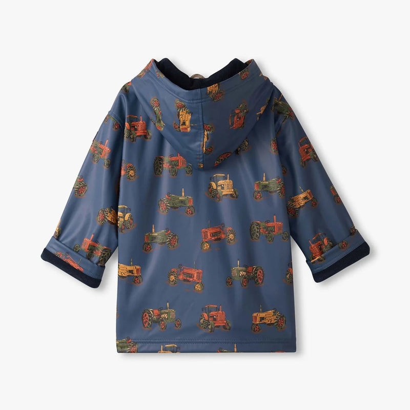Hatley Classic Raincoat in Landscape Tractors print, back view showing hood and allover vintage tractor pattern