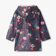 Floral-patterned raincoat on a white background