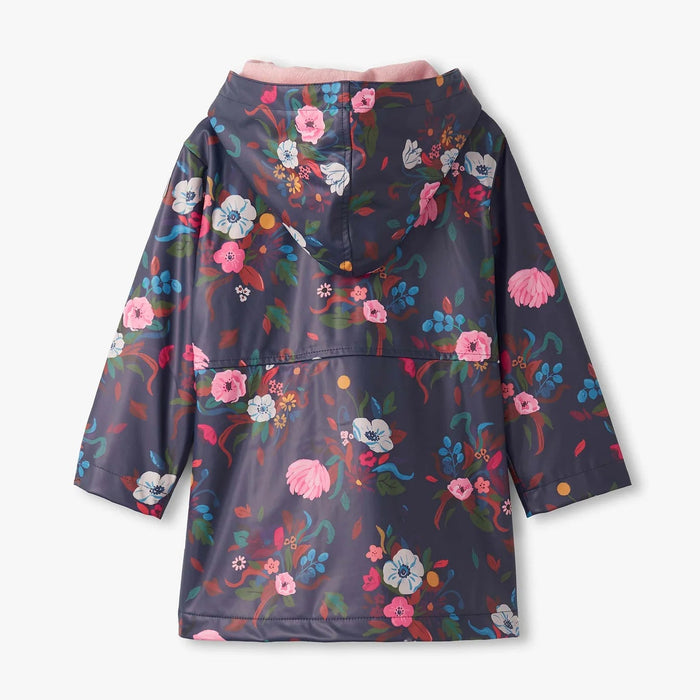 Floral-patterned raincoat on a white background