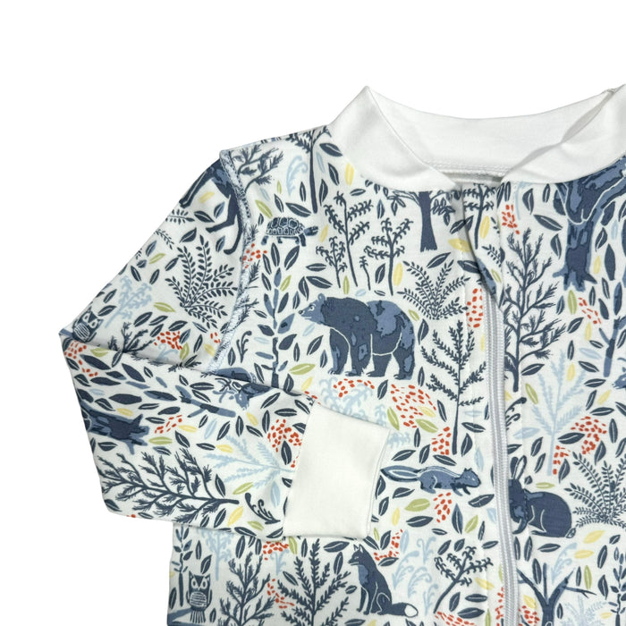 Heyward House footed pajama in Woodland Animals print on white background closeup