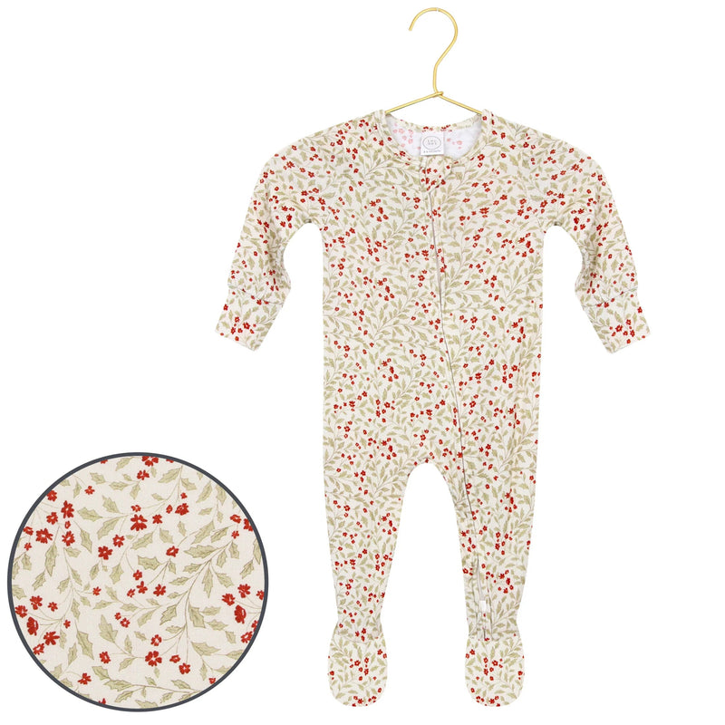 Lou Lou & Co Holly zipper footie with red berry and green leaf print on a hanger, with print close-up