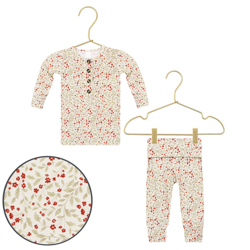 Lou Lou & Co Holly print top and bottom pajama set on hangers, with print close-up