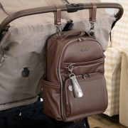 Boss Plus diaper bag attached to a stroller using stroller straps