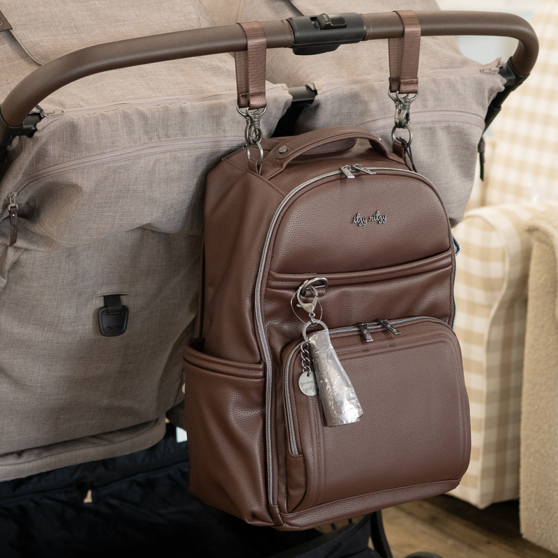 Boss Plus diaper bag attached to a stroller using stroller straps