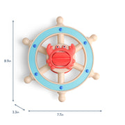 bath toy steering wheel with a crab figure on a white background