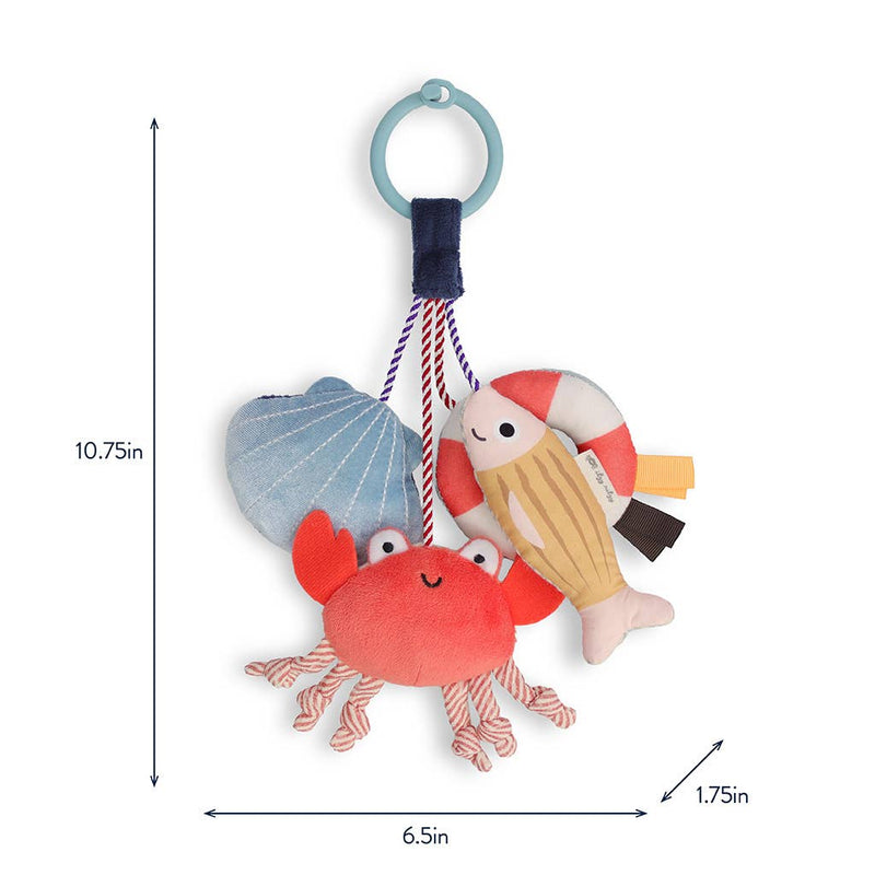 Plush toy with crab, fish, and shell design on a white background