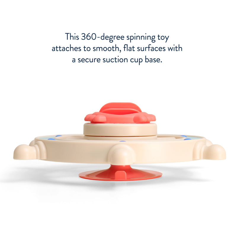 360-degree spinning toy with suction cup base on a white background