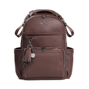 Itzy Ritzy Boss Plus diaper bag backpack shown from the front with tassel detail and multiple pockets