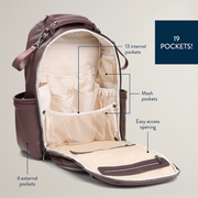 Open Boss Plus diaper bag showing interior organization, pockets, and changing pad