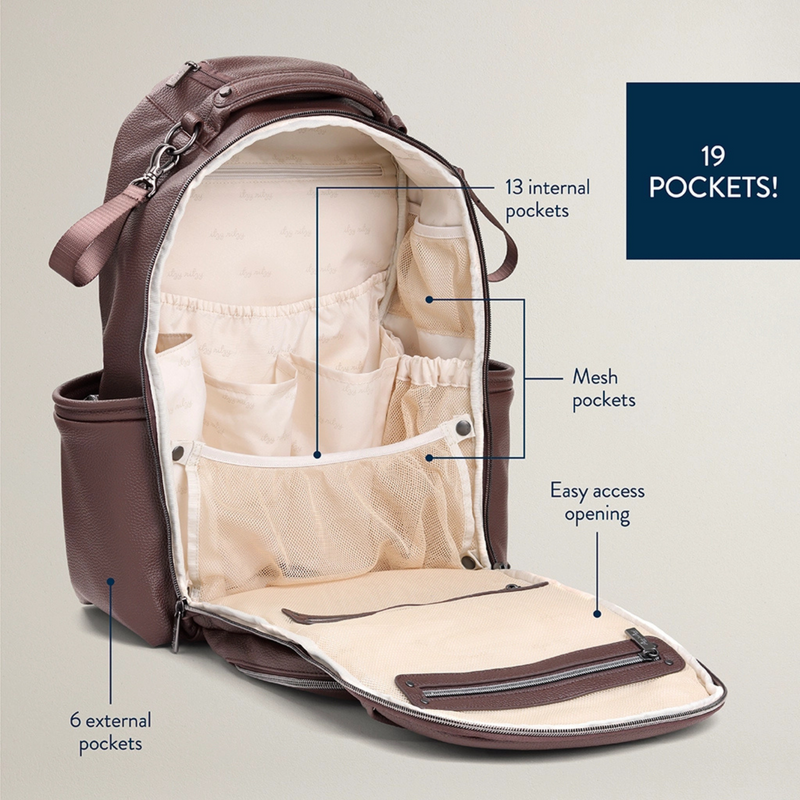 Open Boss Plus diaper bag showing interior organization, pockets, and changing pad