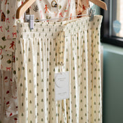 womens wide leg pajama pant by lou lou and company with a christmas tree pattern