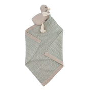 Knitted blanket with a plush toy on a white background
