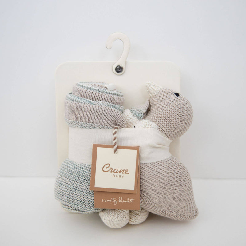 Baby blanket with toy on a hanger against a white background, featuring a 'Crane' brand tag.