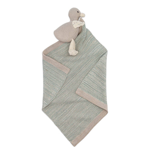 Knitted blanket with a plush toy on a white background