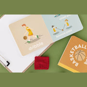 Basketball Baby board book open to the dribble and chest pass pages