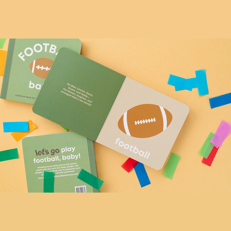 Football Baby board book open to the football page with confetti