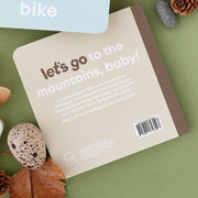Back of the Mountain Baby board book with pinecones