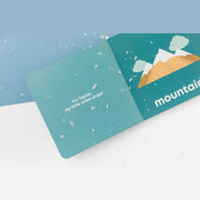 Snow Baby board book open to the mountain page