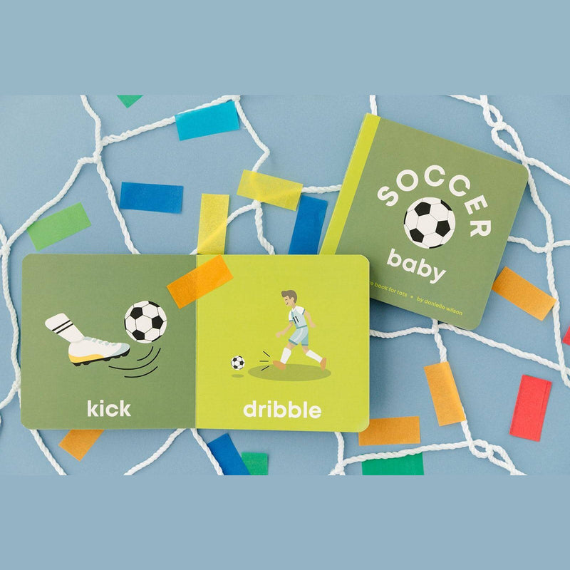 Soccer Baby board book open to the kick and dribble pages