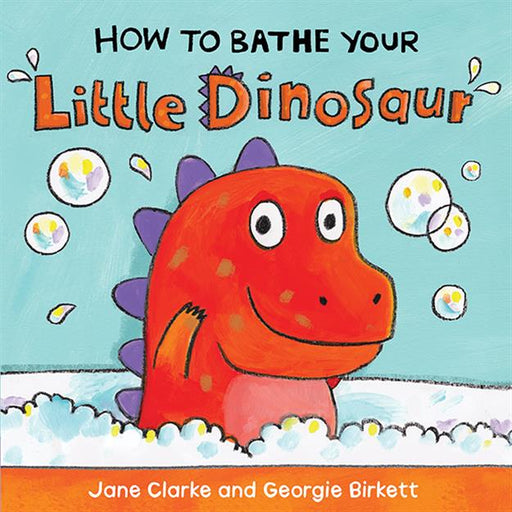 Board book cover for How to Bathe Your Little Dinosaur featuring a smiling red dinosaur sitting in bubbles