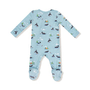 Baby onesie with duck pattern on a light blue background