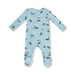 Baby onesie with duck pattern on a light blue background