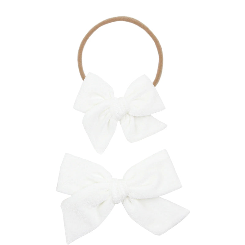 Velvet - Ivory Bow Headband on white background