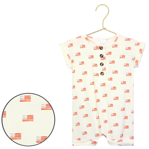 Baby romper with flag pattern on a hanger against a white background