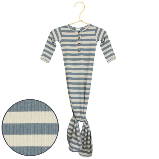 Striped baby outfit on a hanger with close-up of fabric texture.