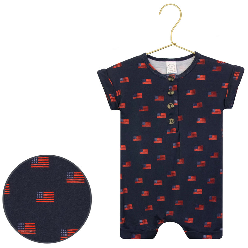 Children's romper with American flag pattern on a hanger against a white background