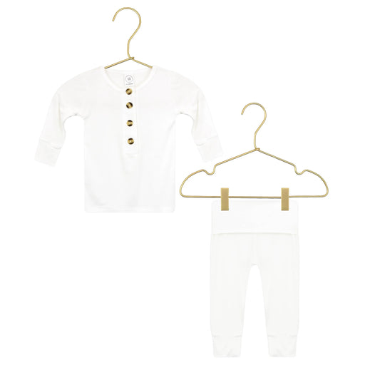 2 piece white newborn set on white background