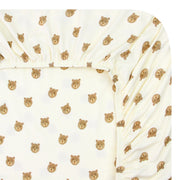 White fabric with small brown bear pattern