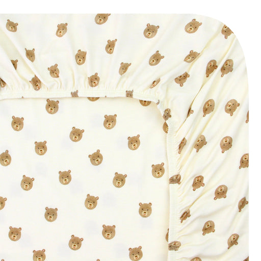 White fabric with small brown bear pattern