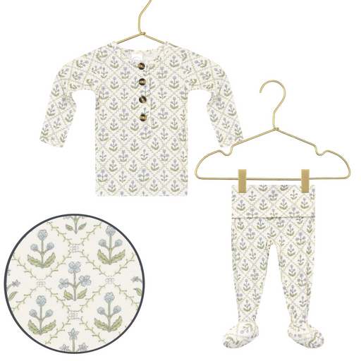 Lou Lou & Co Etta newborn top and bottom set in cream with blue and green floral print displayed on hangers