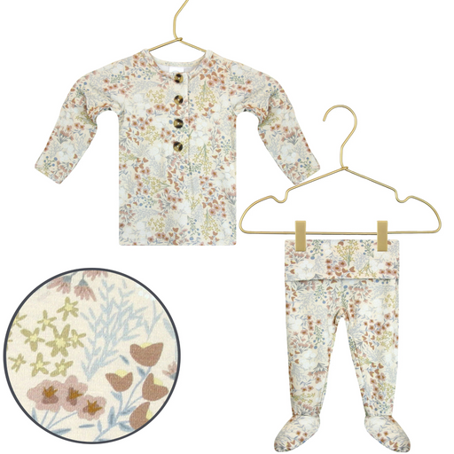 Lou Lou & Co Pearl newborn top and bottom set featuring a soft floral print in cream, dusty rose, sage, and blue tones displayed on gold hangers