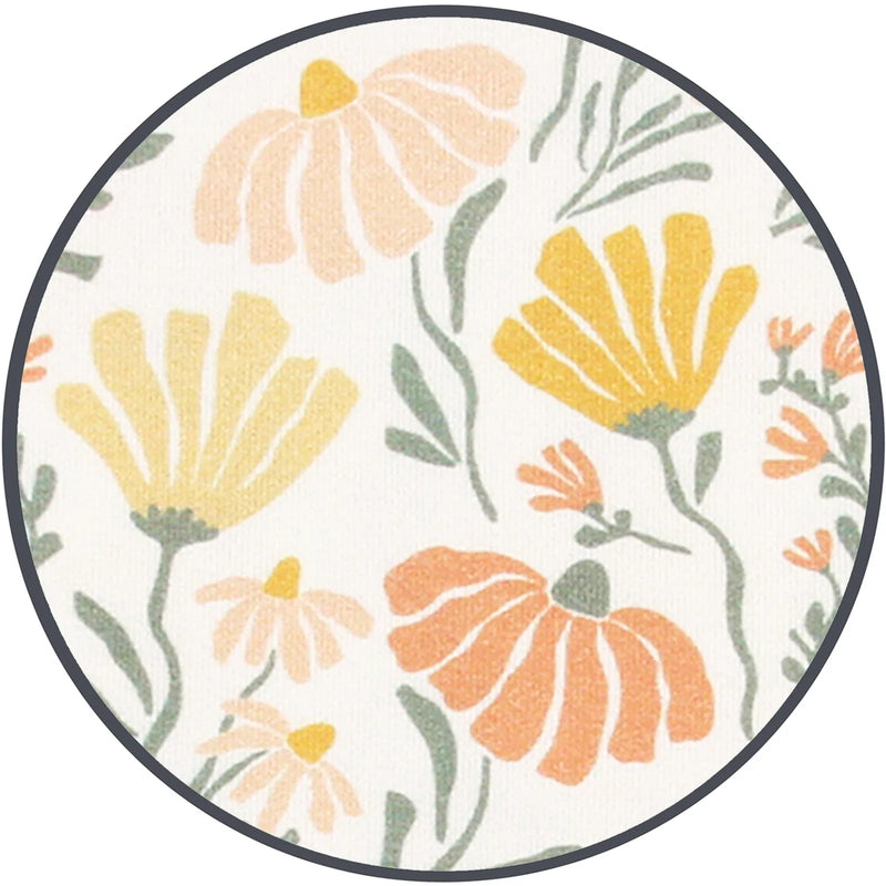 Close-up of Lou Lou & Co Phoebe fabric showing peach, yellow, and coral floral pattern with sage green leaves on a soft cream background