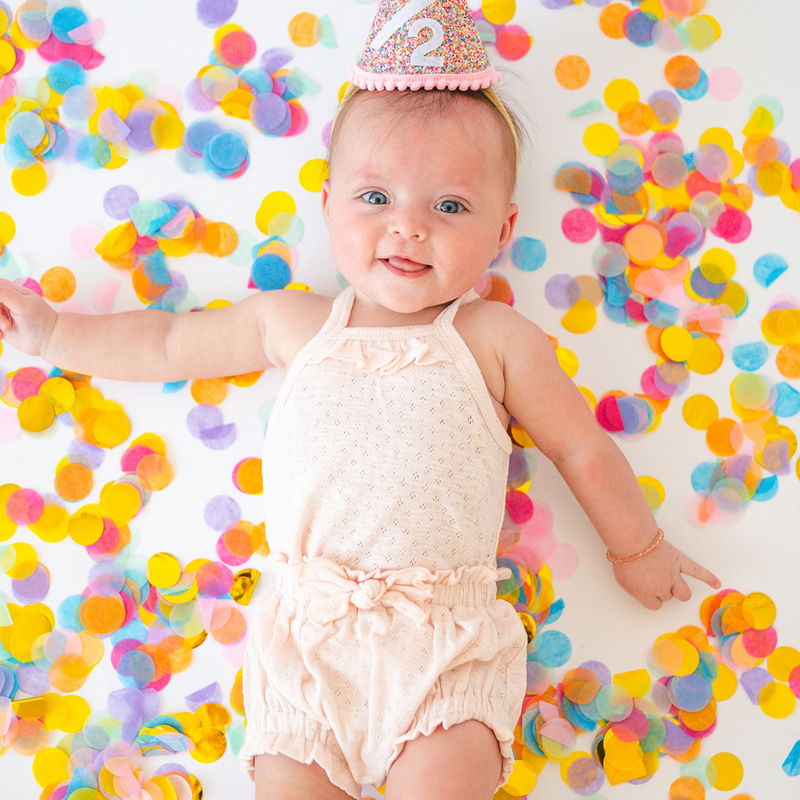 L'ovedbaby | Organic Pointelle Ruffle Criss-Cross Bodysuit | Cotton Candy