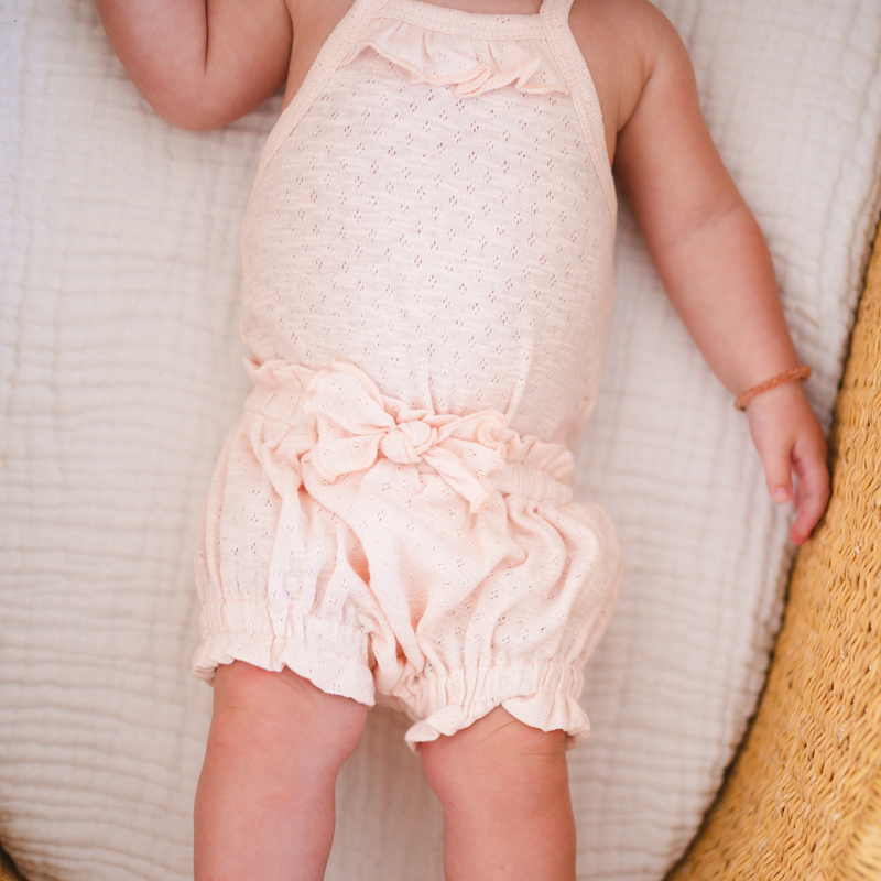L'ovedbaby | Organic Pointelle Ruffle Criss-Cross Bodysuit | Cotton Candy