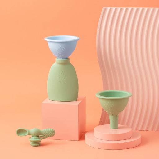 silicone funnel set with palmetto pouches styled on peach backdrop