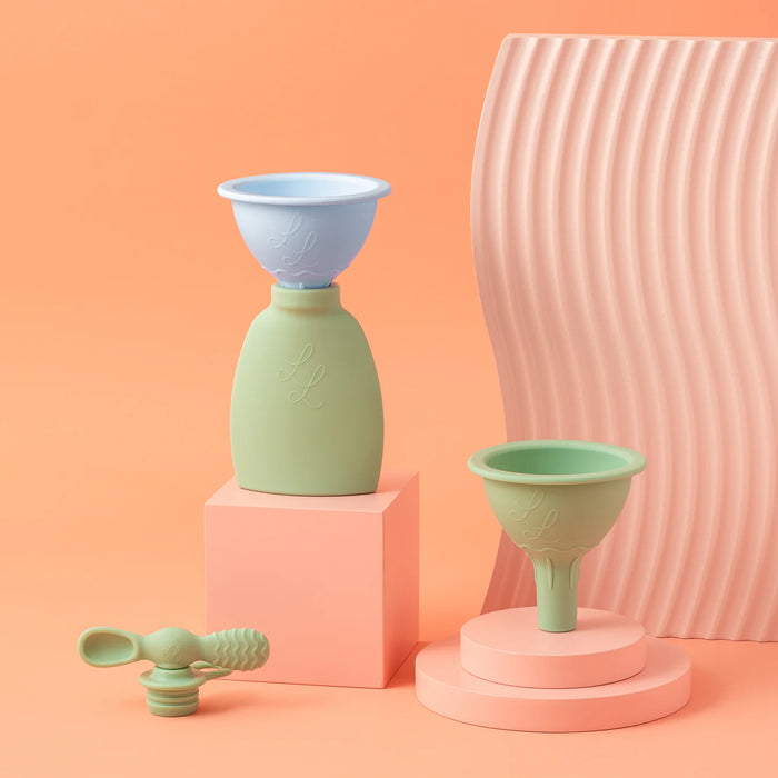 silicone funnel set with palmetto pouches styled on peach backdrop